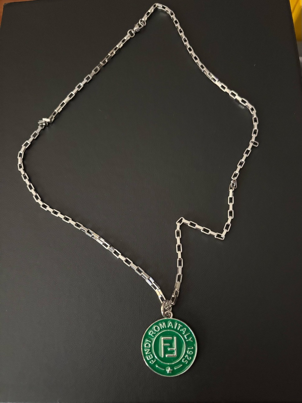 Upcycled charm w/unbranded chain